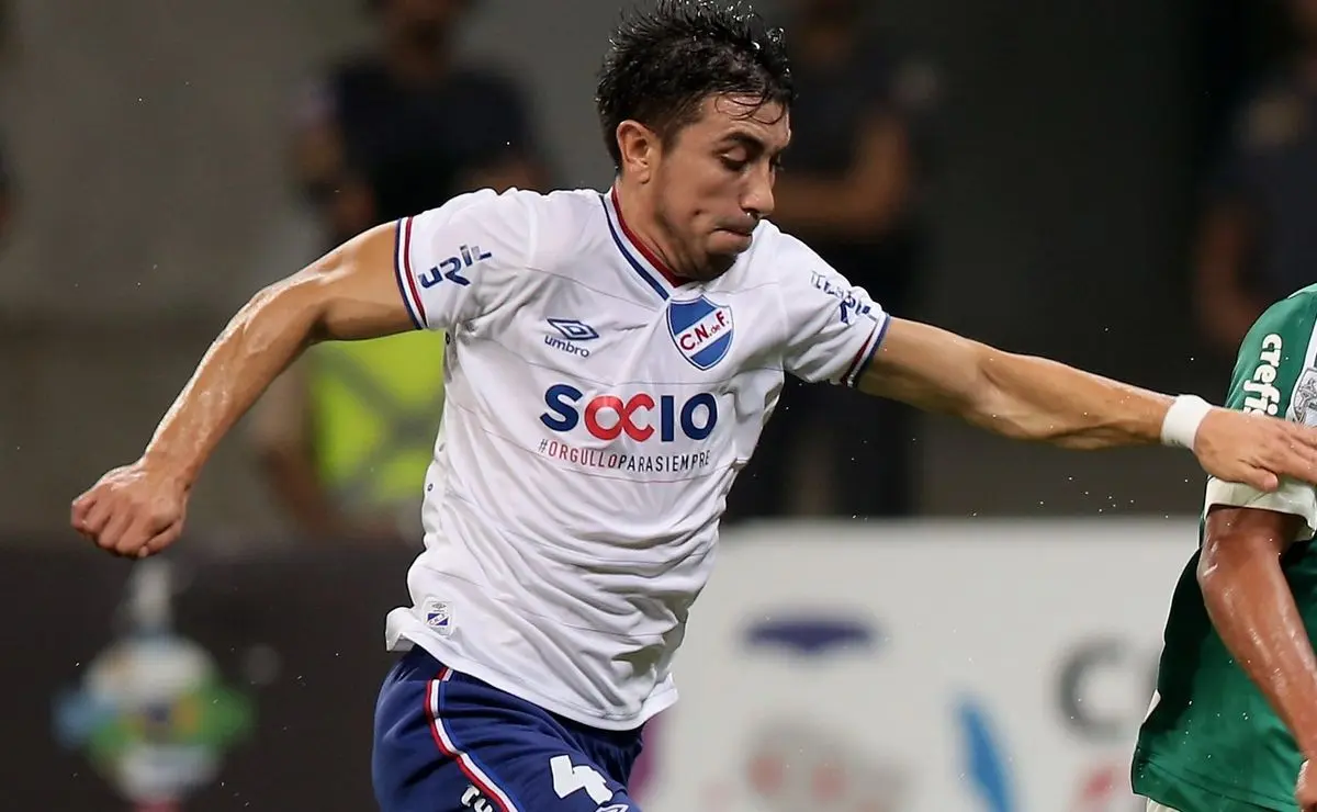 Jorge Fucile recebe Christian Oliva na Vila Belmiro